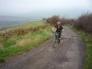 Brian on the Brough Lane climb out of Hope Valley.